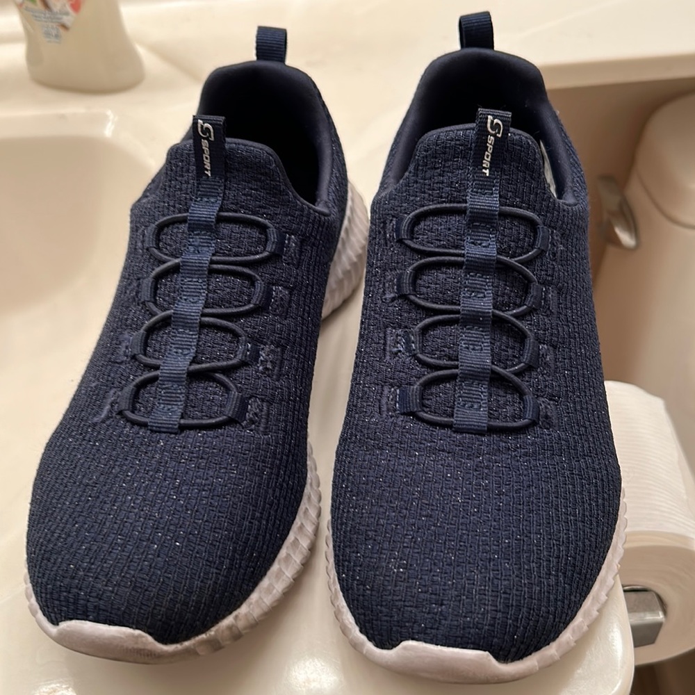 Skechers navy slip in size 7.5